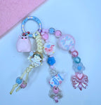 Ciondolo Kawaii Lungo Azzurro Rosa con Maialino e Fiocco - Charm Multiuso Fatto a Mano