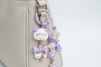 Ciondolo kawaii lilla agganciato alla borsa